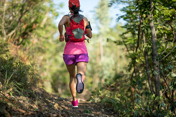 a person running a trail