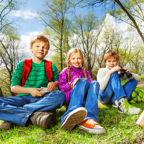 a group of children in the woods